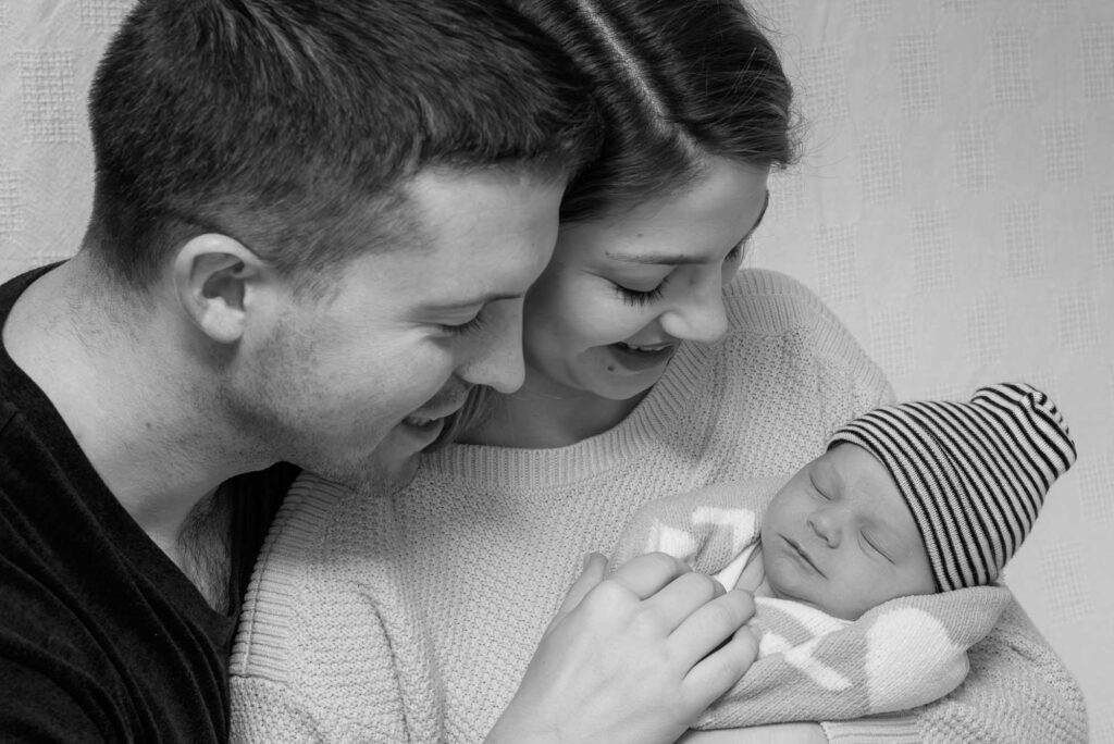 parents experiencing the joy of a newborn
