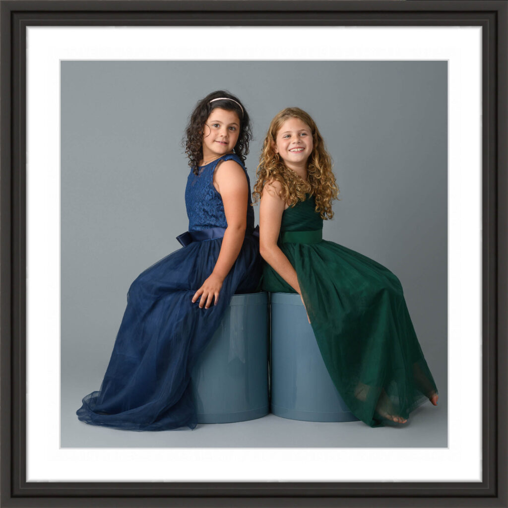 jewel toned dresses compliment each other yet allow the sisters to be unique