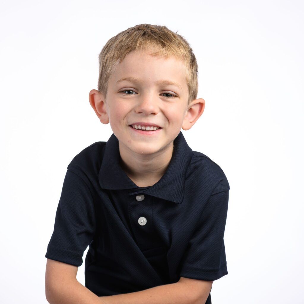 proud 6 year old boy who just counted down from 100