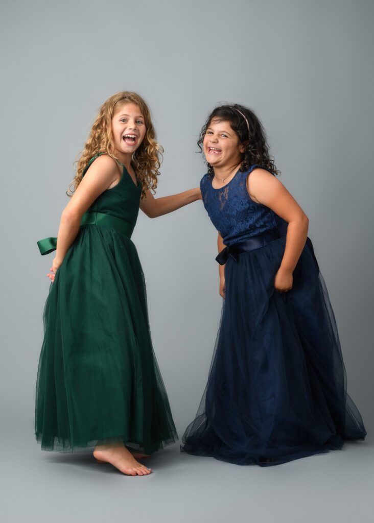 silliness between sisters during photo session