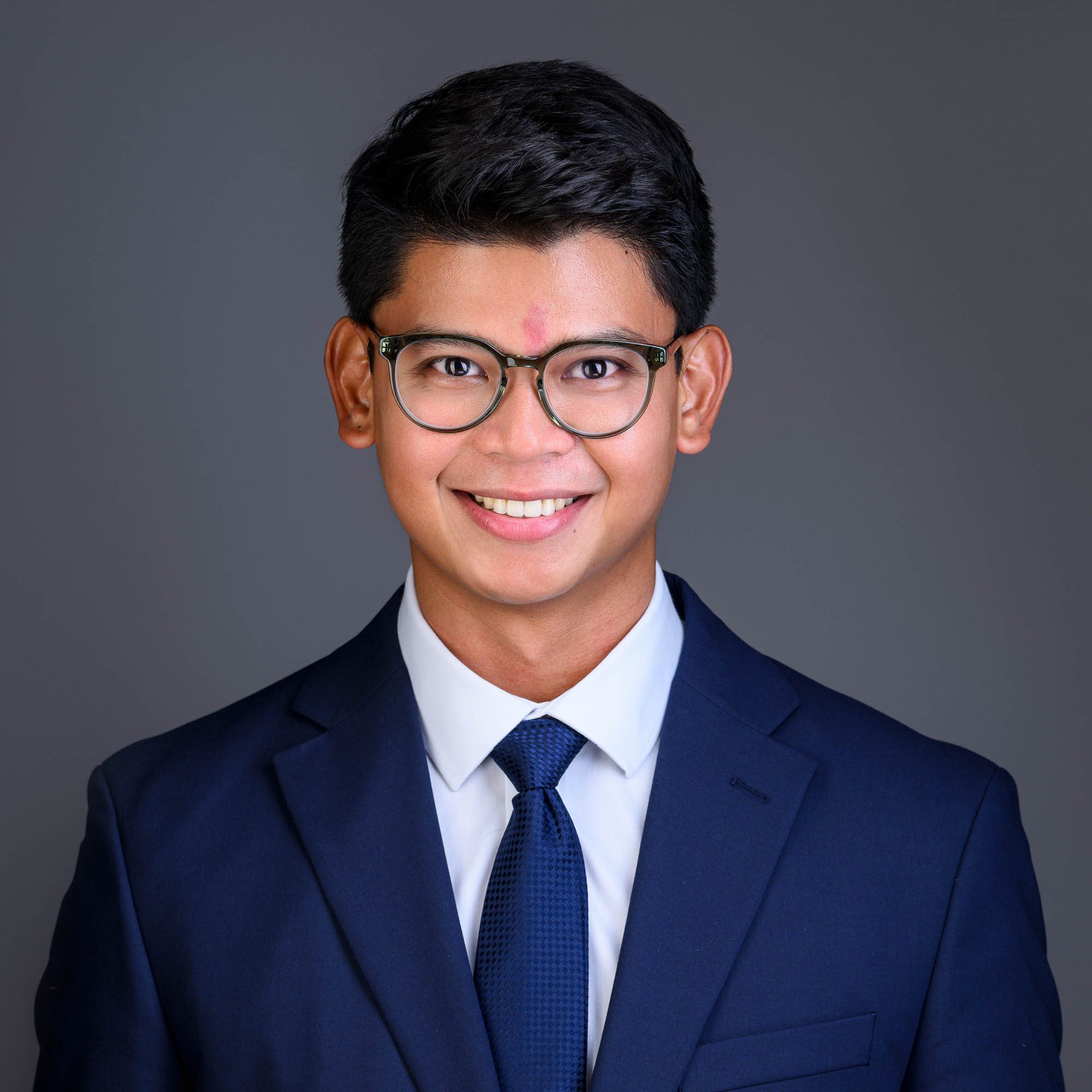 professional headshot for young man making career change