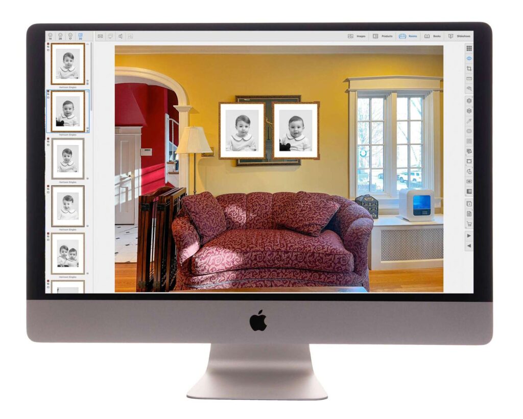 Mac computer displaying design software showing a yellow living room with burgundy sofa and framed portrait gallery wall